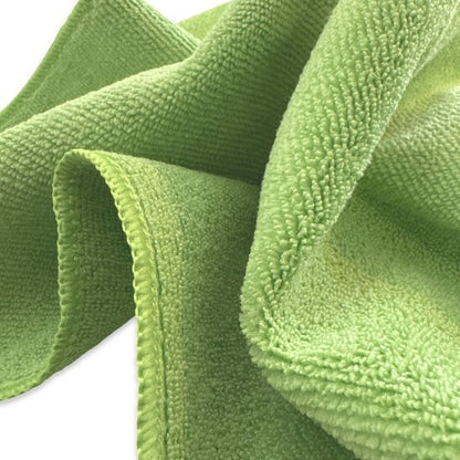 Close-up van de zachte structuur van de groene microvezeldoek
